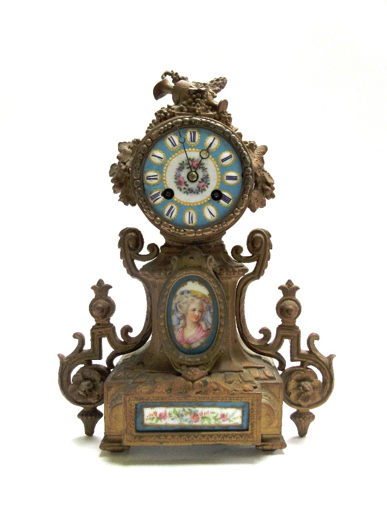 Appraisal: A French gilt metal and porcelain mounted mantel clock th