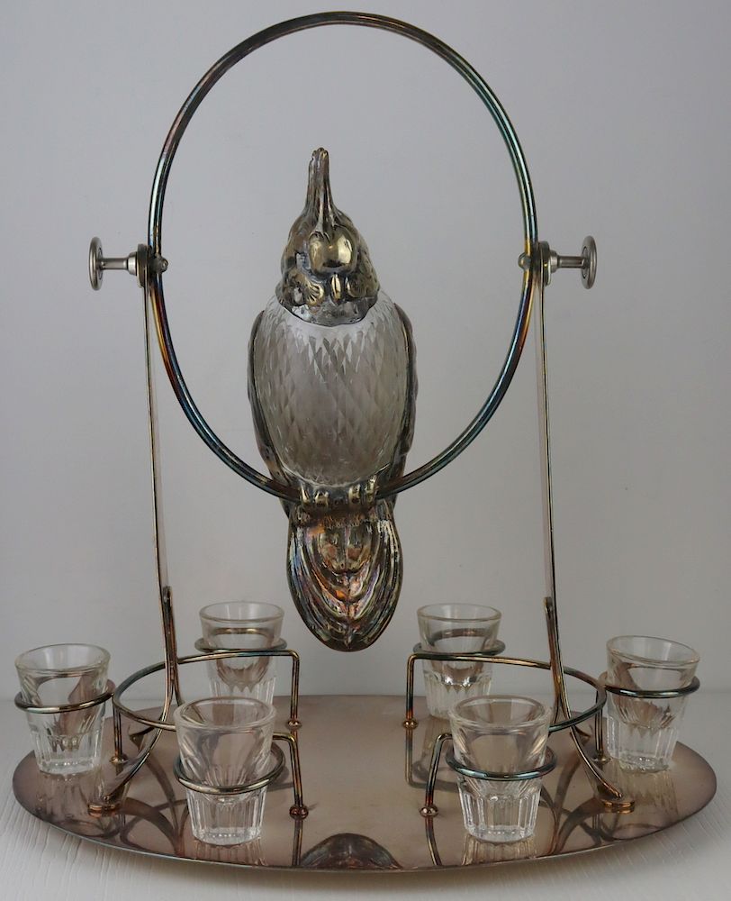 Appraisal: SILVERPLATE Parrot Form Silverplate Decanter Set Unusual silverplate bar set