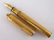 Appraisal: A rolled gold lady's Swan Mabie Todd fountain pen ring