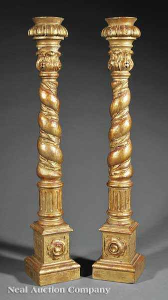 Appraisal: A Pair of Italian Carved Giltwood Candlesticks in the form