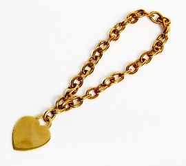 Appraisal: An ct gold Tiffany Co bracelet with heart shaped charm