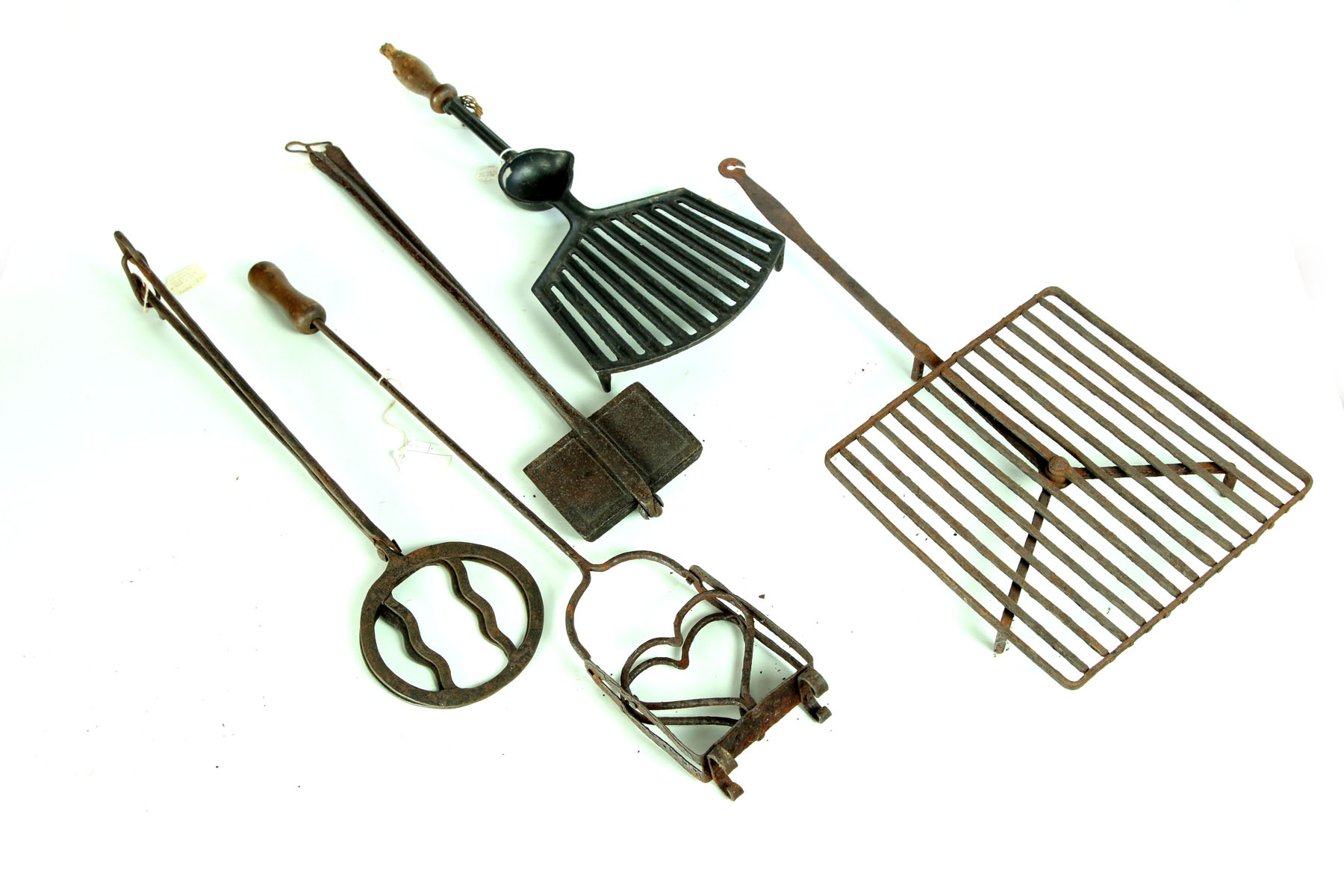 Appraisal: FIVE IRON KITCHEN ITEMS American th century Broiler ''l waffle