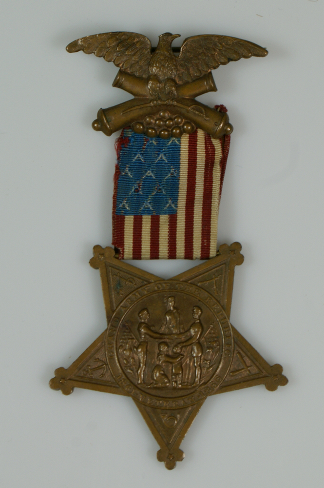 Appraisal: GAR brass medal with eagle and silk flag medal reads