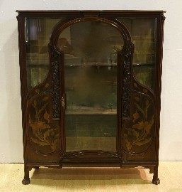 Appraisal: A French Art Noveau walnut and floral marquetry display cabinet