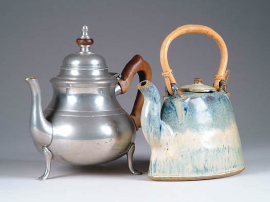 Appraisal: PEWTER TEAPOT AND ART POTTERY TEAPOT - Colonial style teapot