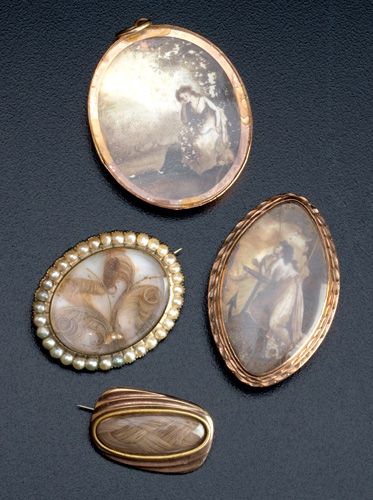 Appraisal: th and th C mourning jewelry two painted and glazed