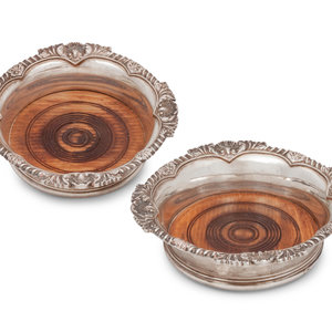 Appraisal: A Pair of English Silver Wine Coasters Roberts and Belk