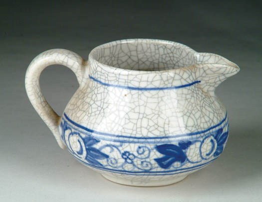 Appraisal: DEDHAM POTTERY HANDLED CREAMER IN THE HORSE CHESTNUT PATTERN Creamer