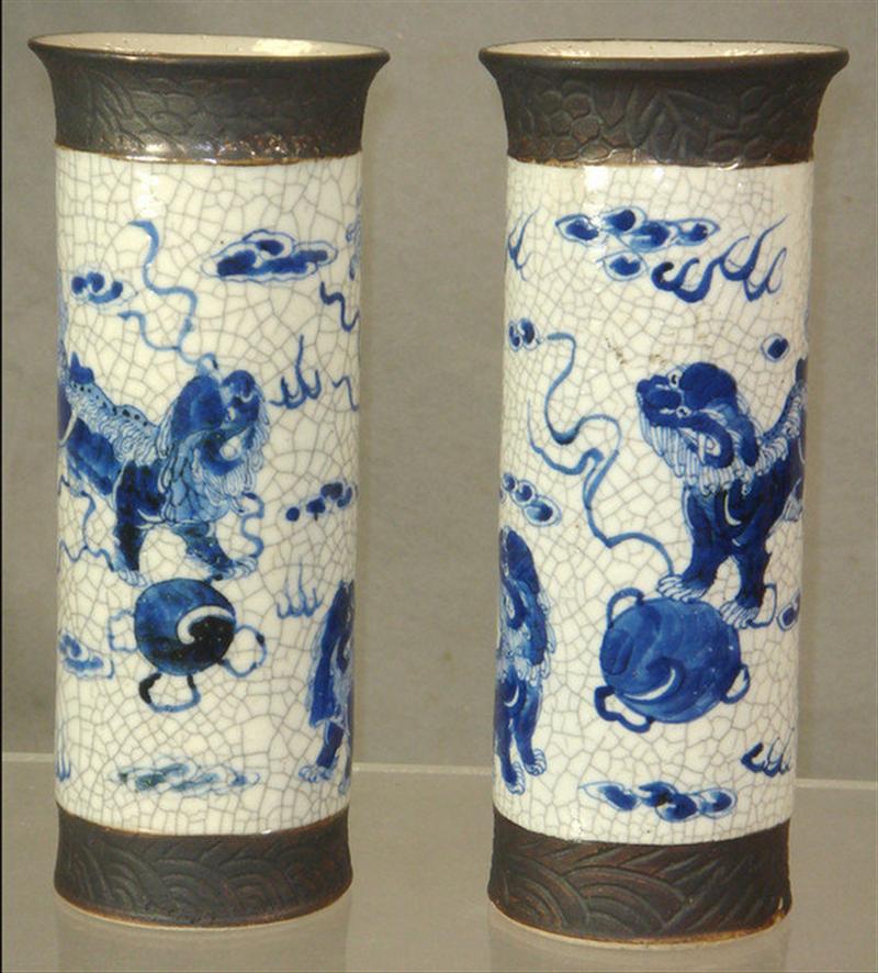 Appraisal: Pair of th c Chinese porcelain tubular vases with foo