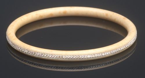 Appraisal: Art Deco diamond-inlaid ivory bangle bracelet Cylindrical mm ivory ring