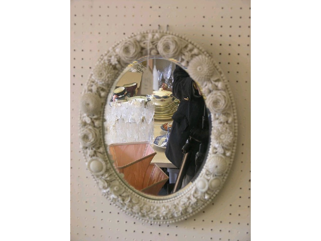 Appraisal: A Belleek-style floral encrusted mirror oval shape encrusted with numerous