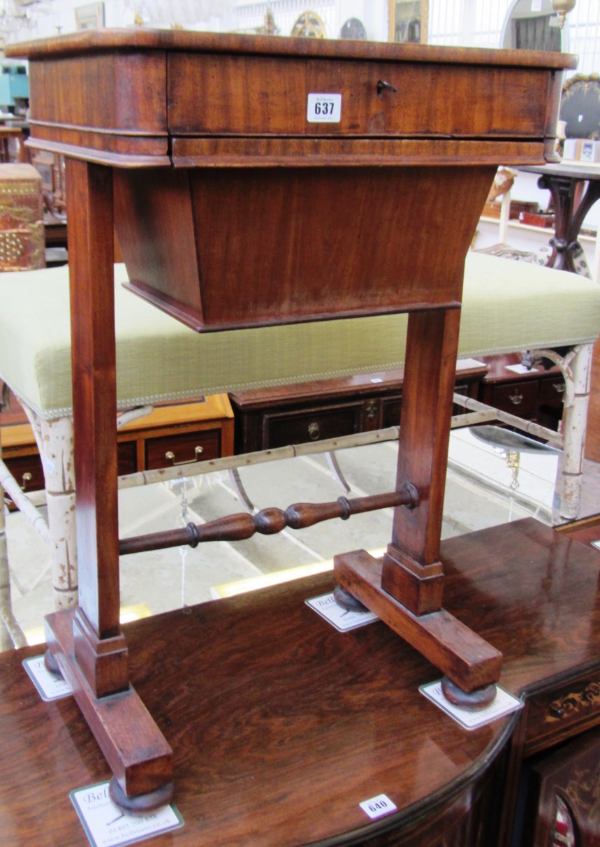 Appraisal: A Victorian mahogany work table with wool box and trestle