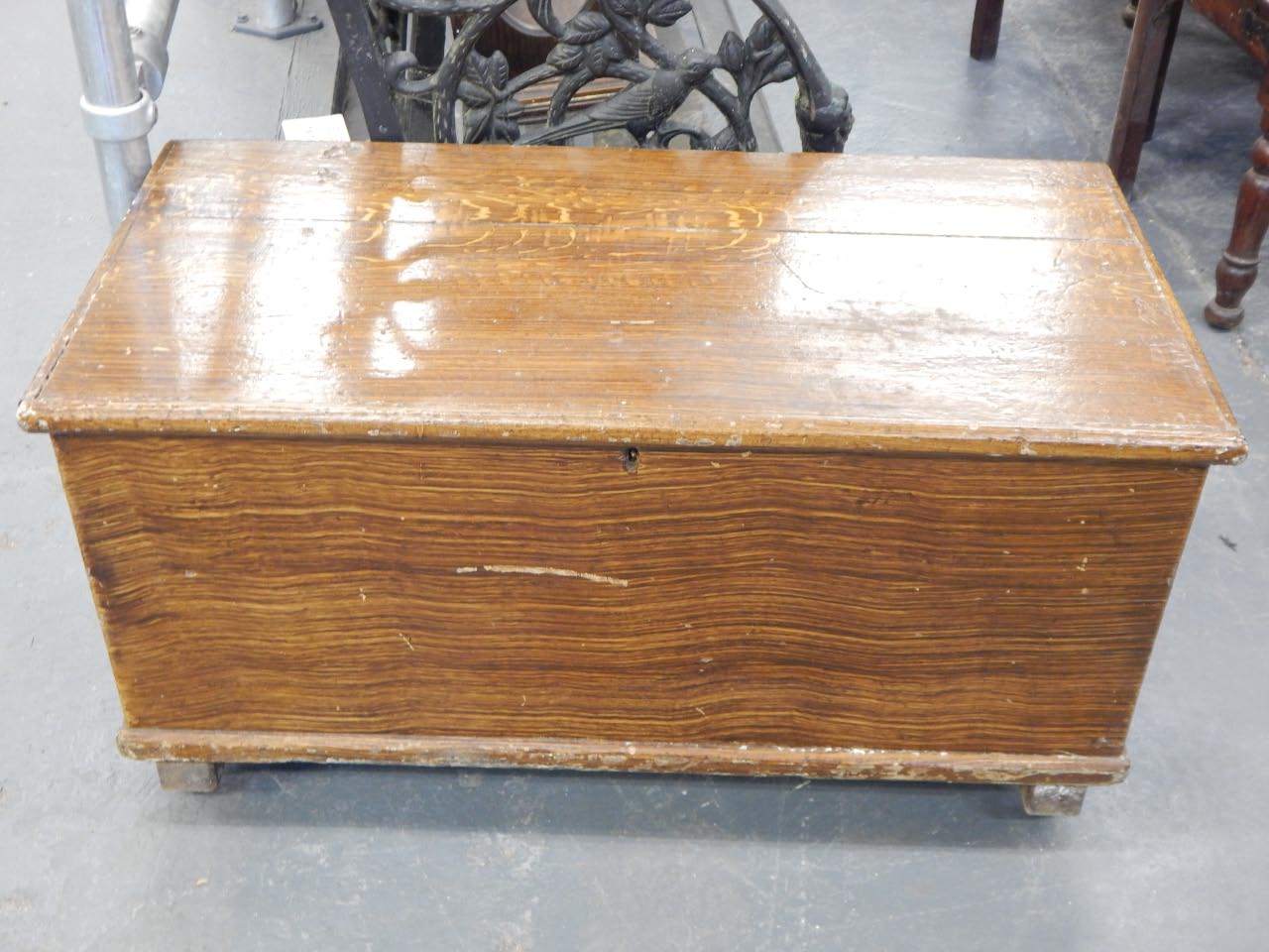 Appraisal: A Victorian scumbled pine blanket box with a painted oak