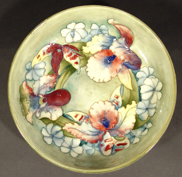 Appraisal: Moorcroft bowl hand painted and tubelined with orchids onto a