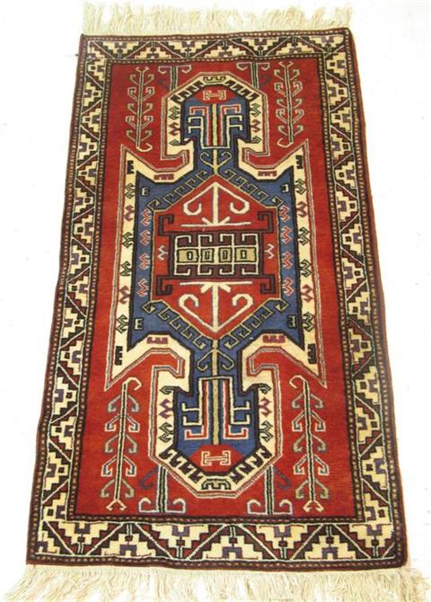 Appraisal: ORIENTAL RED GROUND RUG x in