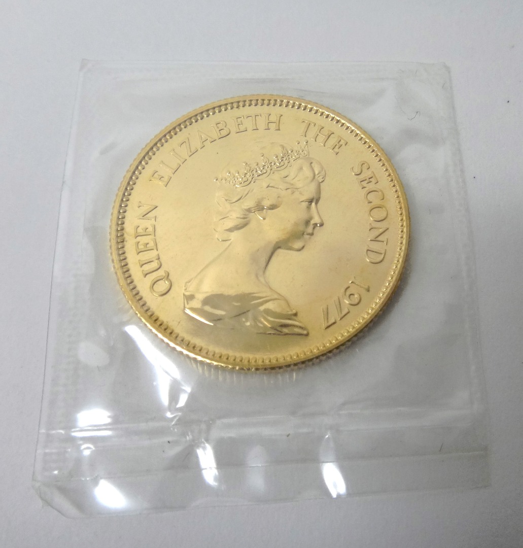 Appraisal: A Hong Kong gold one thousand dollars commemorating The Year