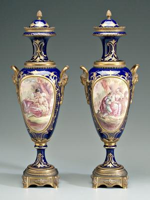 Appraisal: Pair ormolu mounted S vres urns hand painted panels with