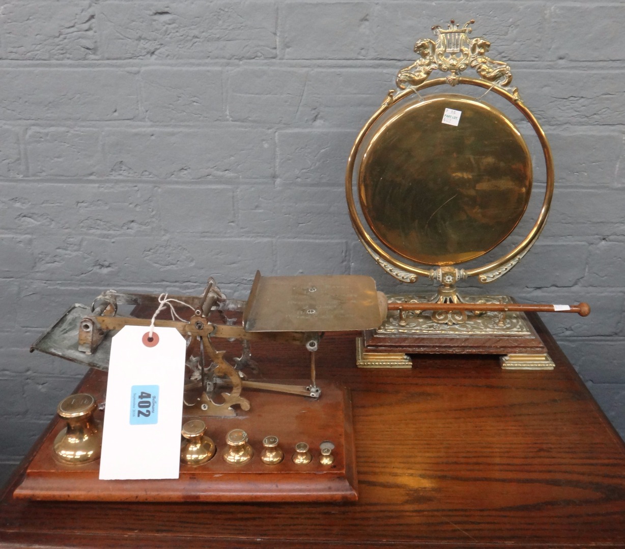 Appraisal: A set of Victorian brass postal scales the rectangular walnut