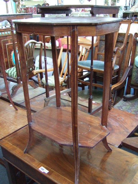 Appraisal: A late th century mahogany and satinwood banded occasional table