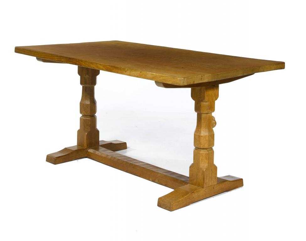 Appraisal: A MOUSEMAN OAK DINING TABLE BY ROBERT THOMPSON OF KILBURN