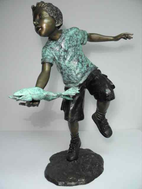 Appraisal: Bronze fountain sculpture depicting a boy with a frog Unsigned