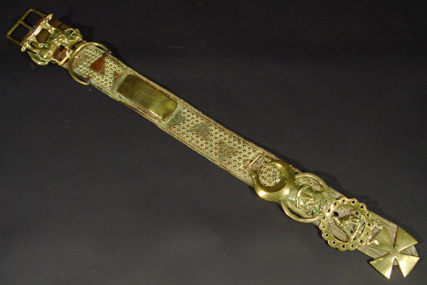 Appraisal: Selection of horse brasses on a studded leather strap the