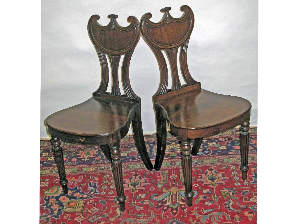 Appraisal: A pair of Regency mahogany hall chairs -