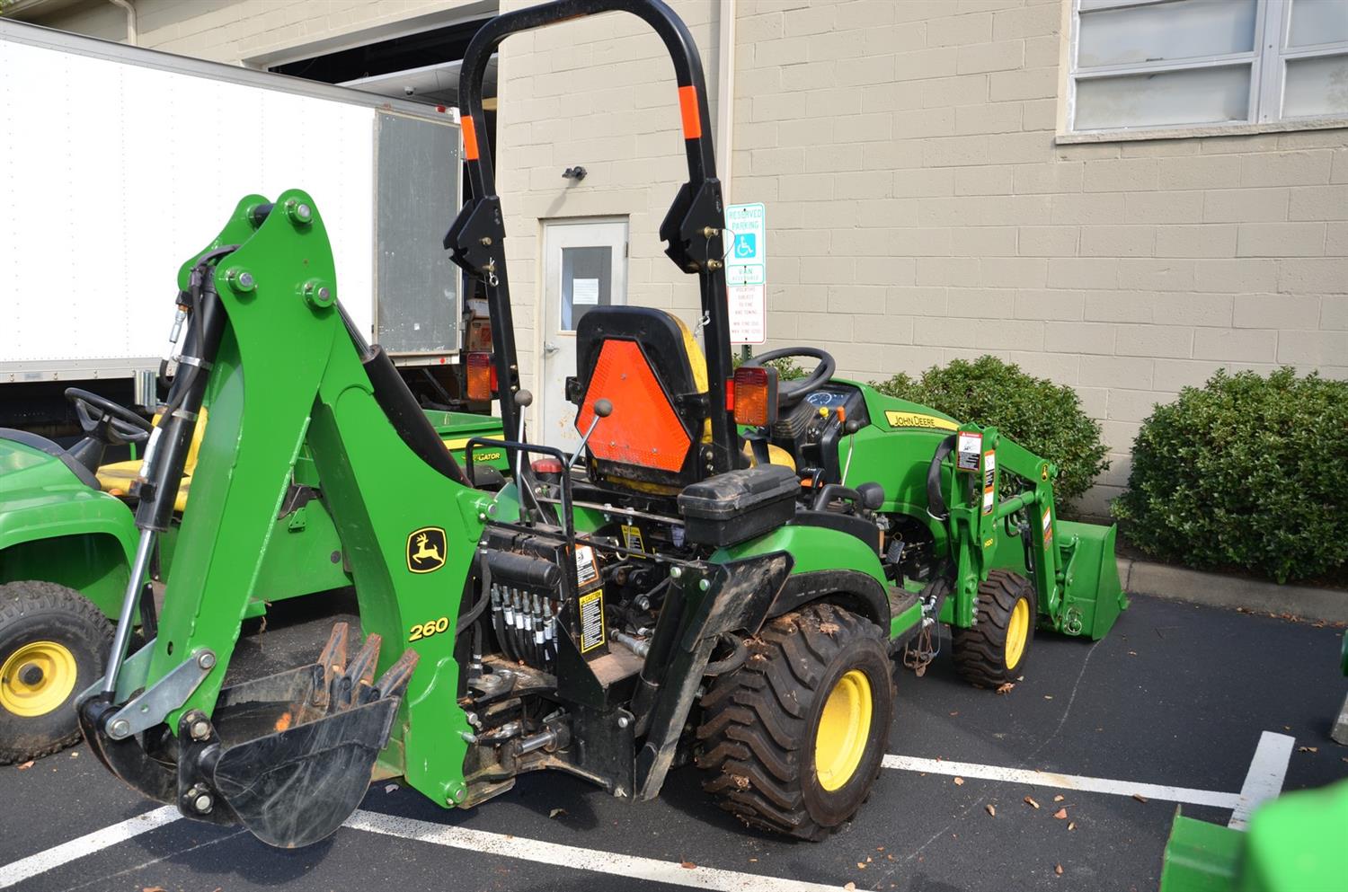 Appraisal: John Deere R diesel yard tractor with JD backhoe H