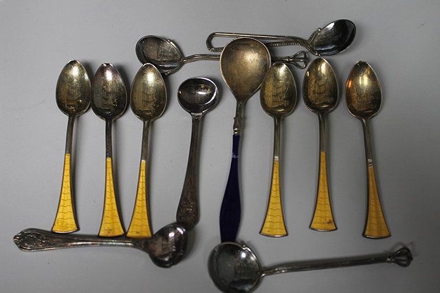 Appraisal: A COLLECTION OF SILVER AND ENAMEL SPOONS and various other