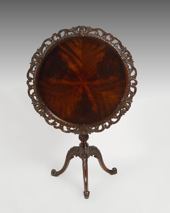 Appraisal: RICHLY CARVED MAHOGANY TILT TOP TABLE Pierce carved pie crust