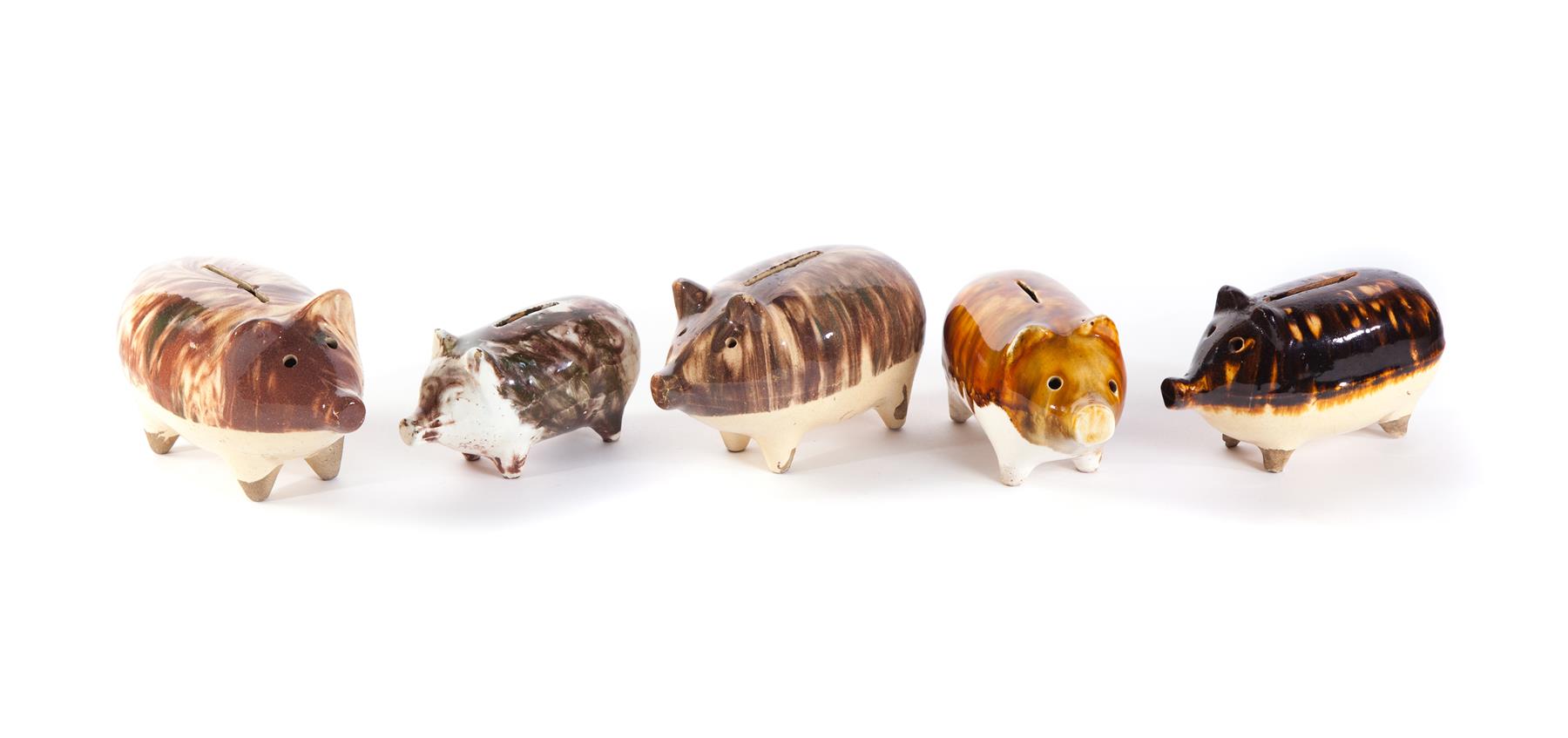 Appraisal: FIVE AMERICAN POTTERY PIGGY BANKS Second half- th century Yellow