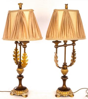 Appraisal: A pair of Empire style bronzed metal table lamps cm