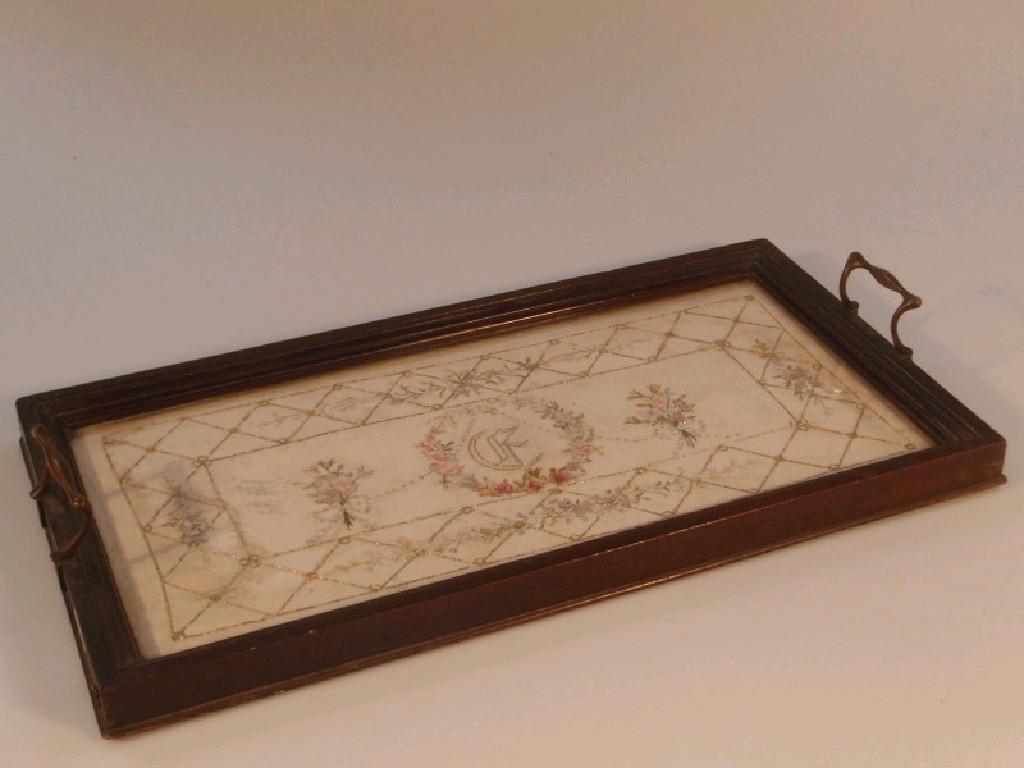 Appraisal: A mahogany framed serving tray with Russian needlework panel under