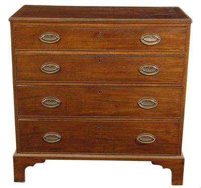 Appraisal: An early th century mahogany chest the crossbanded and reeded