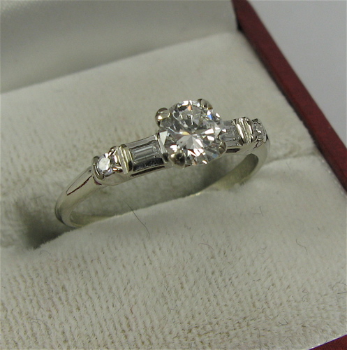 Appraisal: DIAMOND AND K WHITE GOLD RING WITH APPRAISAL centering a