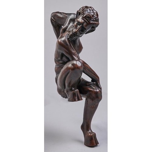 Appraisal: An Italian carved and stained walnut statuette of a satyr