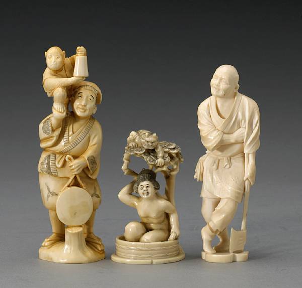 Appraisal: Three small ivory figural okimono th Century The first of