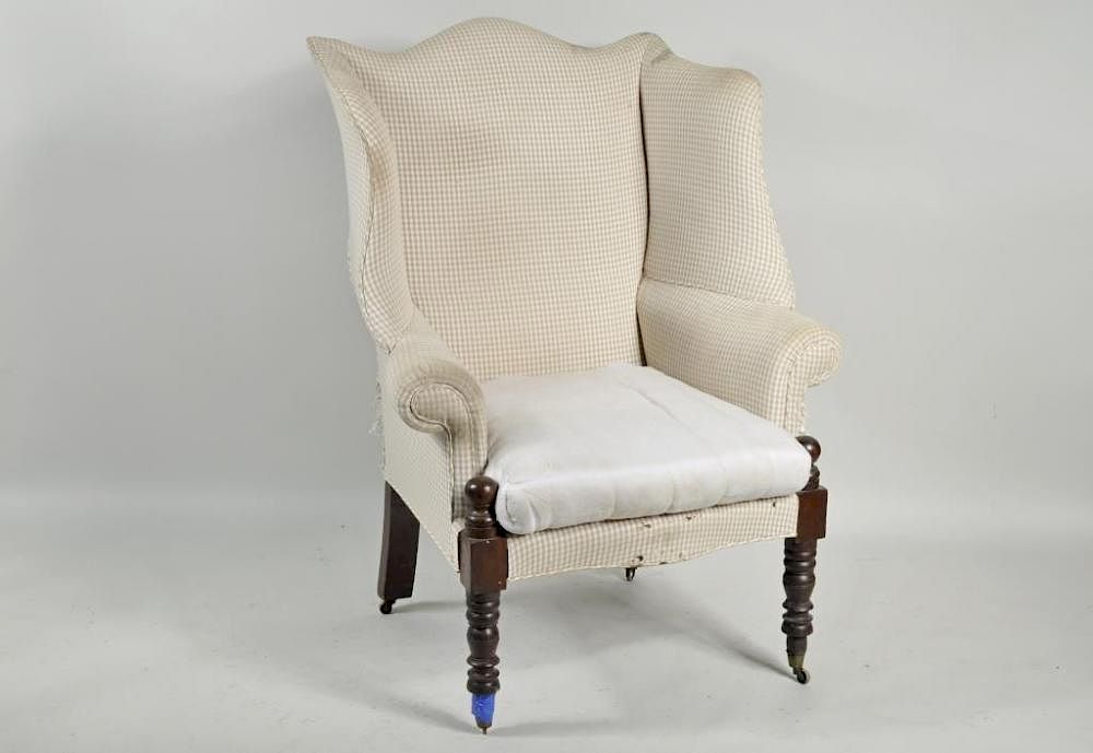 Appraisal: Portsmouth Sheraton Wing Chair Exposed Leg Sheraton mahogany upholstered wing