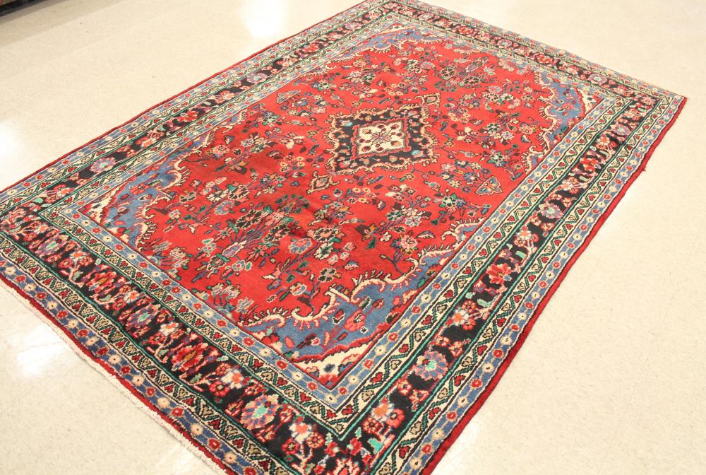 Appraisal: HAND KNOTTED PERSIAN HAMADAN CARPET floral and central floral medallion