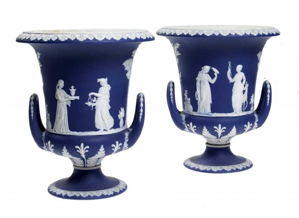 Appraisal: A PAIR OF WEDGWOOD JASPER WARE VASES of campana shape