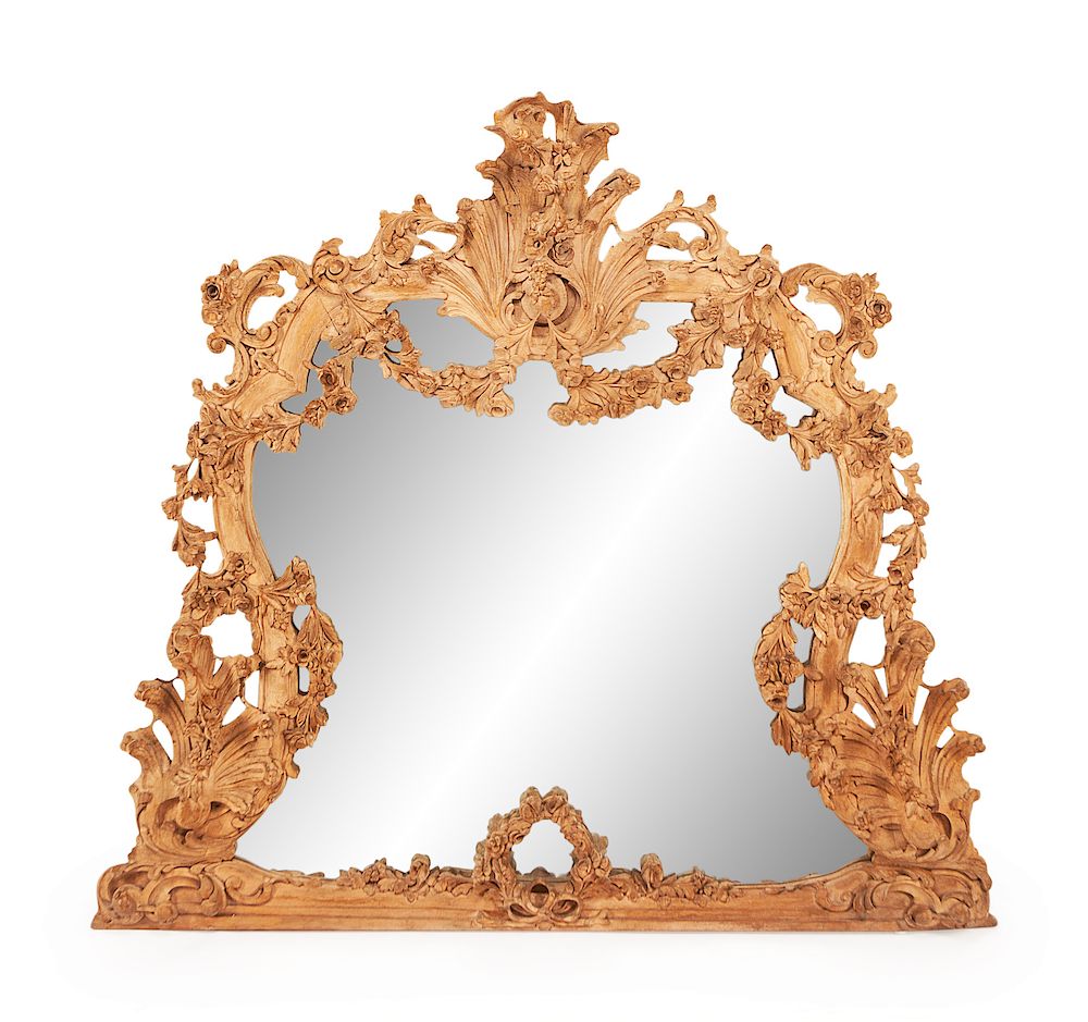 Appraisal: An Italian Carved Walnut Mirror An Italian Carved Walnut Mirror