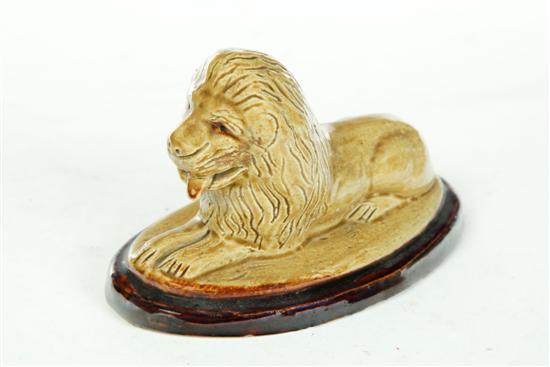 Appraisal: POTTERY LION American late th-early th century white clay Yellow