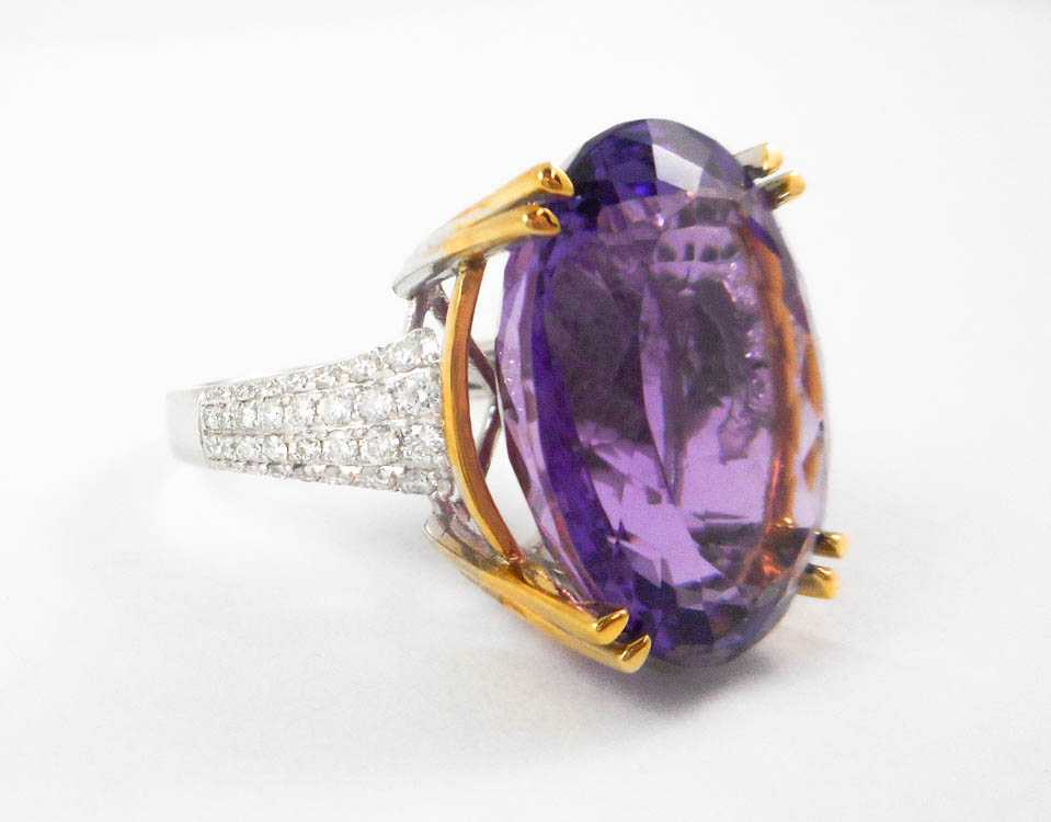 Appraisal: AMETHYST DIAMOND AND FOURTEEN KARAT GOLD RING The white and