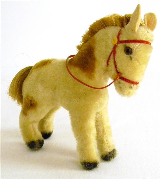 Appraisal: A Steiff stuffed horse or pony with red leather saddle