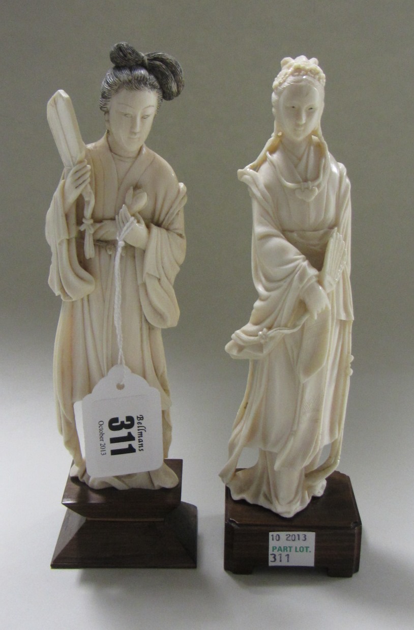 Appraisal: Two Chinese ivory figures of women early th century each