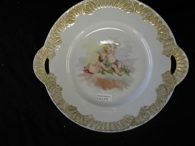 Appraisal: Victorian Porcelain Cake Plate cherub decor