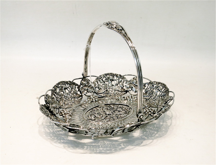 Appraisal: STERLING SILVER FOOTED BASKET by Theodore B Starr having low