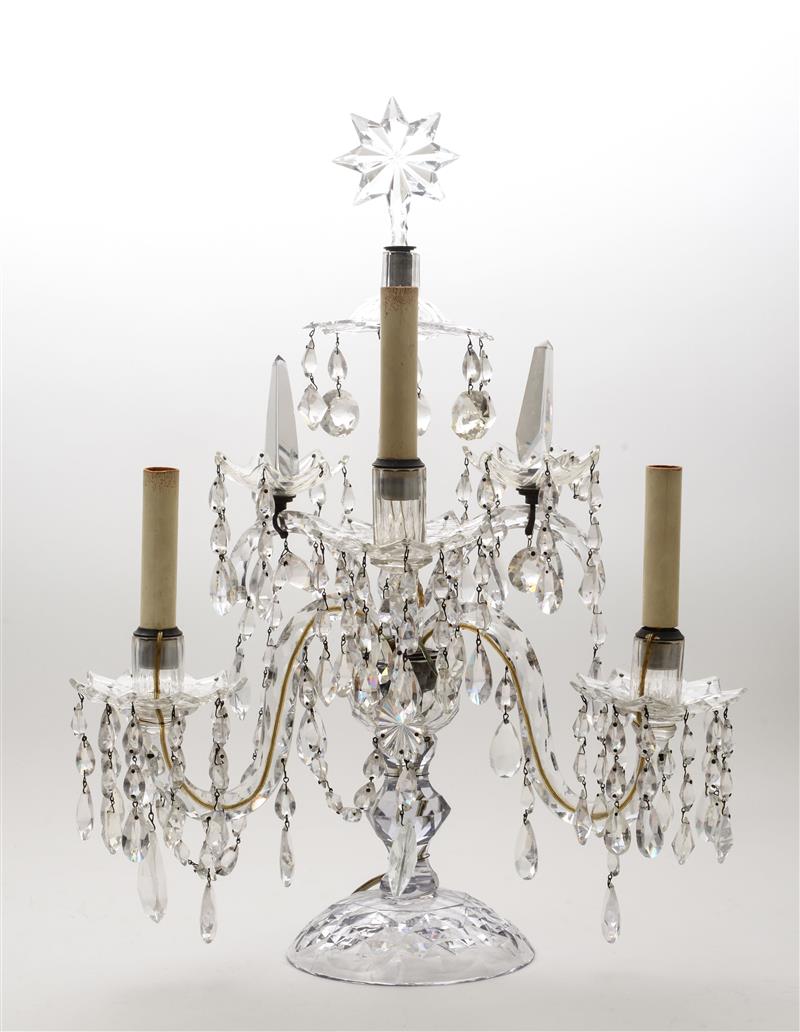 Appraisal: GEORGE III STYLE CUT-GLASS THREE-LIGHT CANDELABRUM The shaped stem supporting