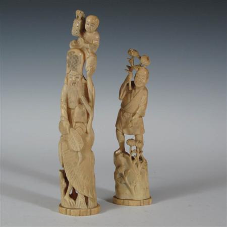 Appraisal: A Japanese carved ivory figure group Meiji period depicting an