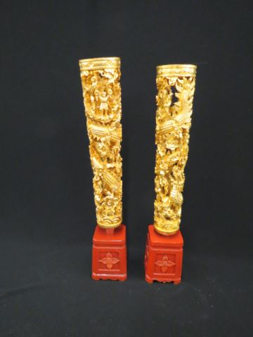 Appraisal: Pair of Chinese Carved Wooden Ceremonial Pieces scenes of figures